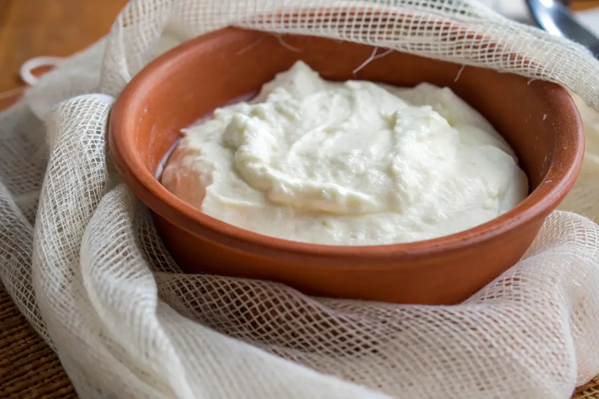 Traditional Greek yogurt being strained for health benefits